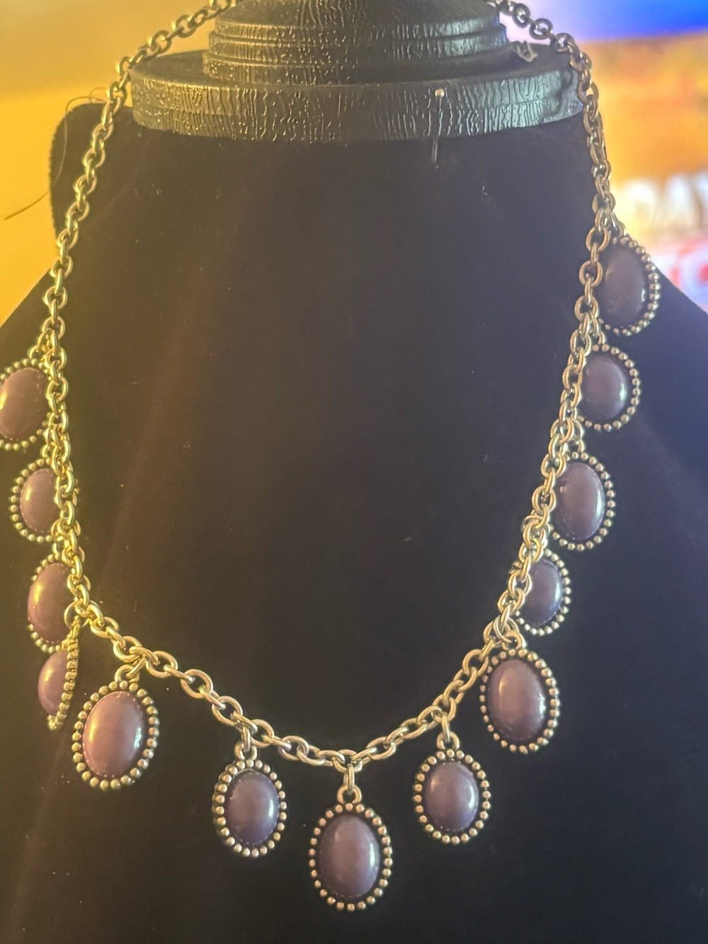 Elegant Silver Tone Necklace with Purple Oval Cabochons